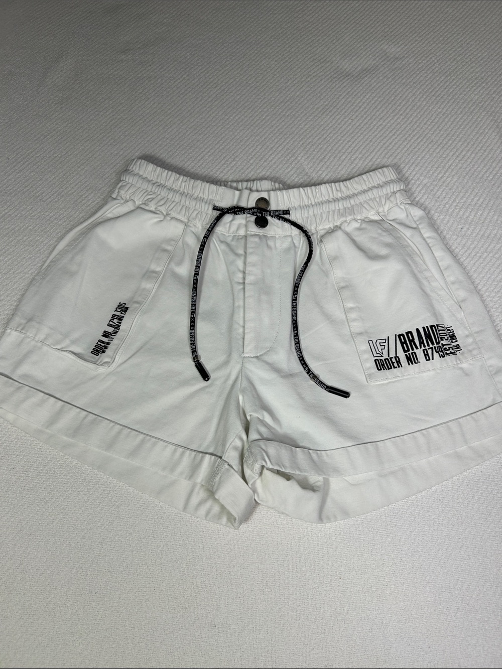 LF Women’s White Athletic Drawstring Shorts with Black Accent Graphics